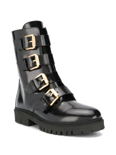 Shop Moschino Buckled Ankle Boots In Black