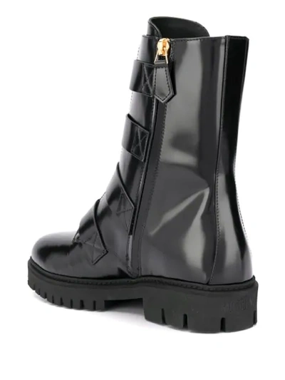 Shop Moschino Buckled Ankle Boots In Black