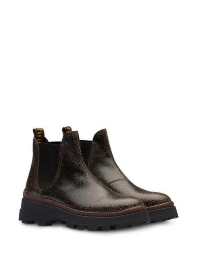 Miu Miu Cracked-effect Ankle Boots In Brown