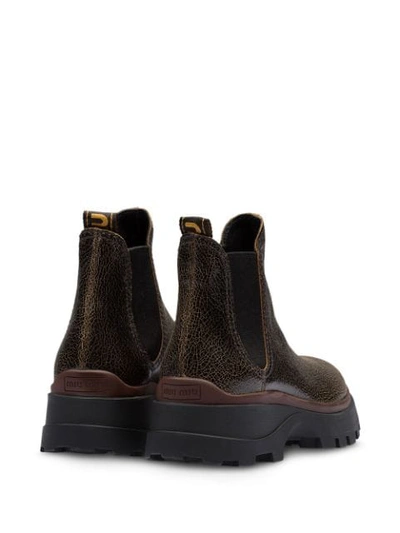 Miu Miu Cracked-effect Ankle Boots In Brown