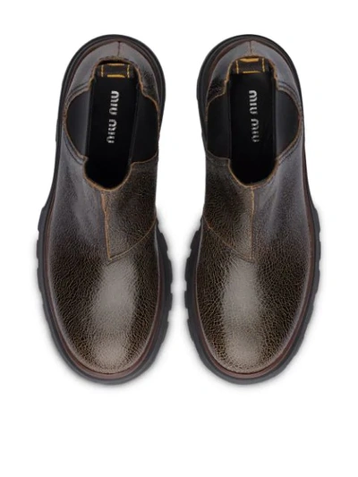 Miu Miu Cracked-effect Ankle Boots In Brown