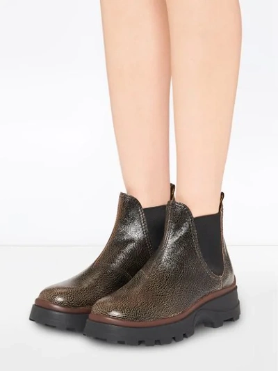 Shop Miu Miu Cracked-effect Ankle Boots In Brown