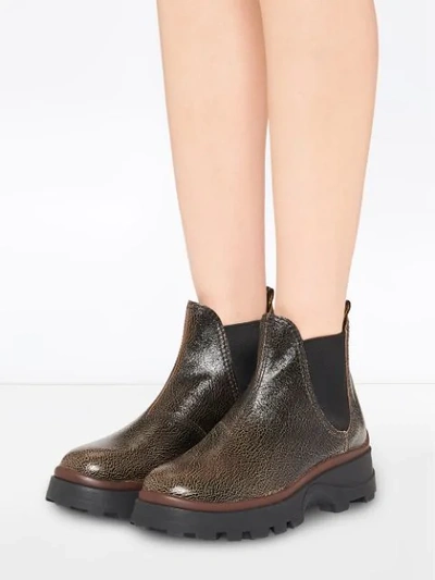 Miu Miu Cracked-effect Ankle Boots In Brown