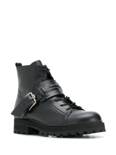 Shop Tod's Buckled Strap Boots In Black