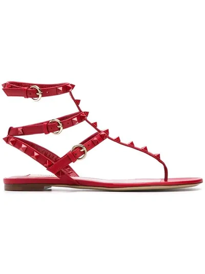 Shop Valentino Garavani Rockstud Flat Sandals - Red