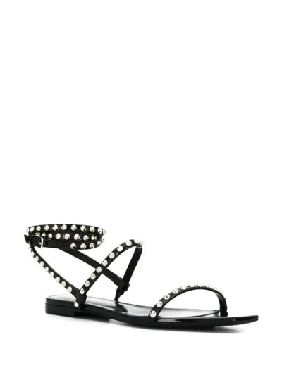Shop Saint Laurent Studded Flat Sandals In Black