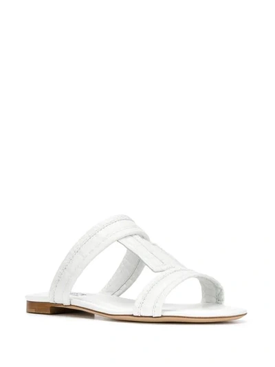 Shop Tod's Flat Sandals In White