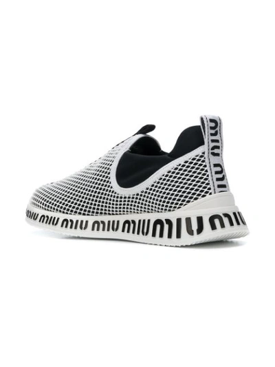 Shop Miu Miu Slip-on Sneakers - Black