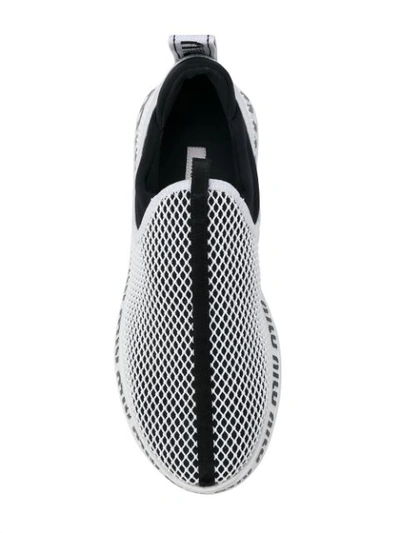 Shop Miu Miu Slip-on Sneakers - Black