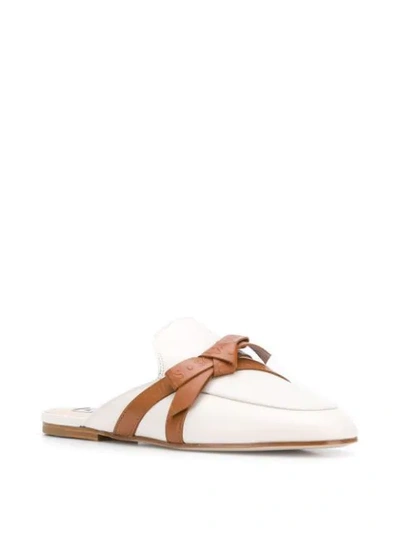 Shop Tod's Bow In White