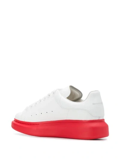 Shop Alexander Mcqueen Contrasting Sole Sneakers In White