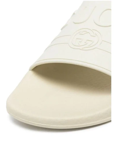 Shop Gucci Pursuit Logo Sliders In White