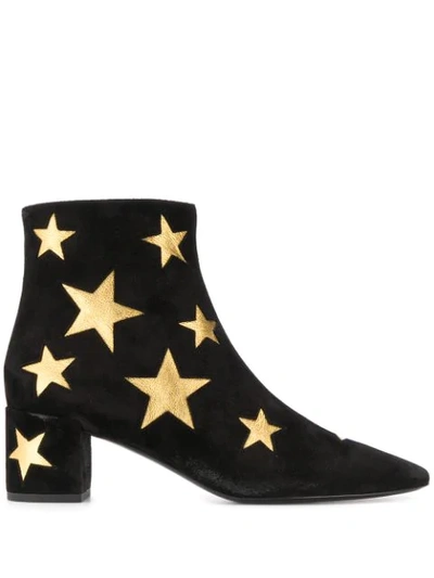 Shop Saint Laurent Star Patch Ankle Boots In Black