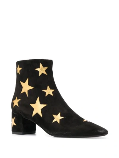 Shop Saint Laurent Star Patch Ankle Boots In Black