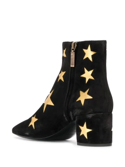 Shop Saint Laurent Star Patch Ankle Boots In Black