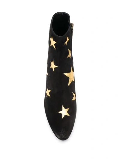 Shop Saint Laurent Star Patch Ankle Boots In Black