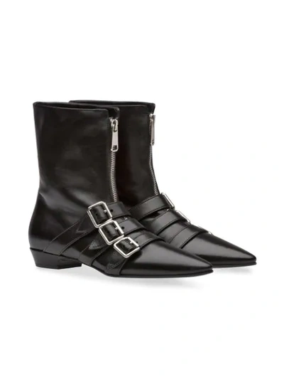 Shop Miu Miu Decorative Straps Ankle Boots - Black