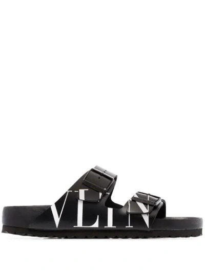 Shop Valentino X Birkenstock Arizona Vltn Slides In Black