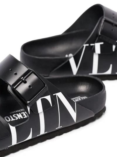 Shop Valentino X Birkenstock Arizona Vltn Slides In Black