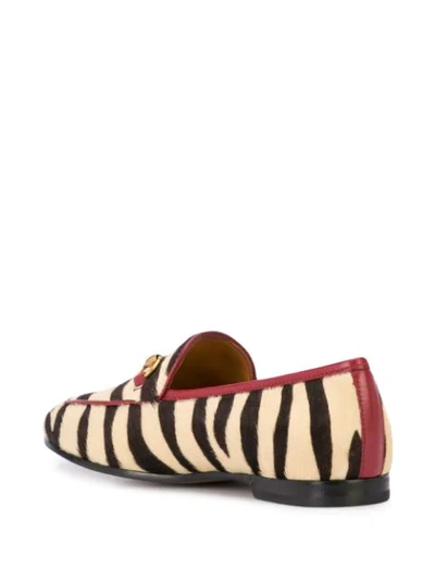 Shop Gucci Zebra Horsebit Loafers In Black