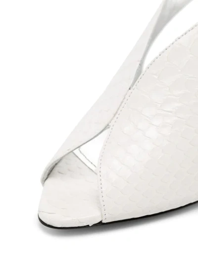 Shop Givenchy Snake-effect Mules In White