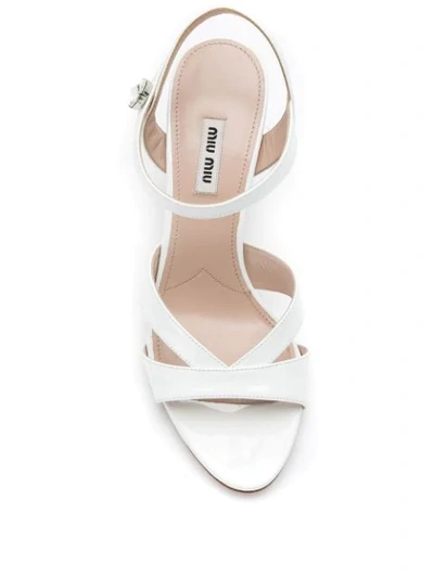 Shop Miu Miu Patent Leather Sandals In White