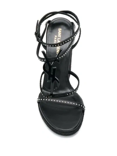 Shop Saint Laurent Cassandra 105 Wedge Sandals In Black