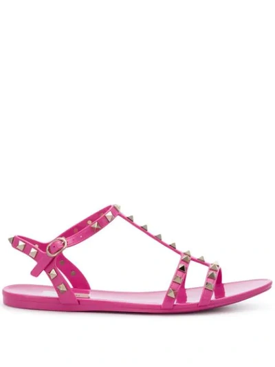 Shop Valentino Rockstud Slide Sandals In Pink