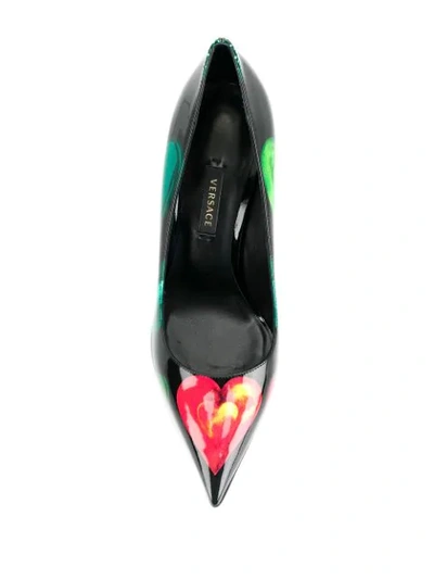 Shop Versace Heart Print Pumps In Black