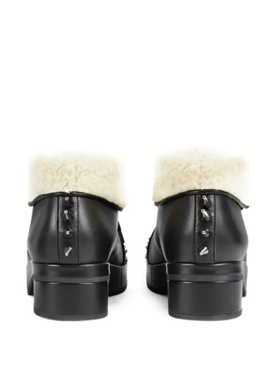 Shop Gucci Studded Ankle Boots In Black