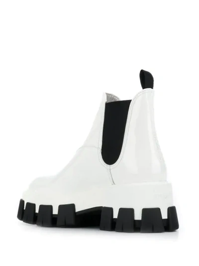 Shop Prada Ridged Sole Ankle Boots In F0009 Bianco