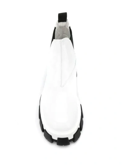 Shop Prada Ridged Sole Ankle Boots In F0009 Bianco