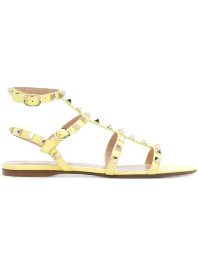Shop Valentino Garavani Rockstud Sandals - Yellow