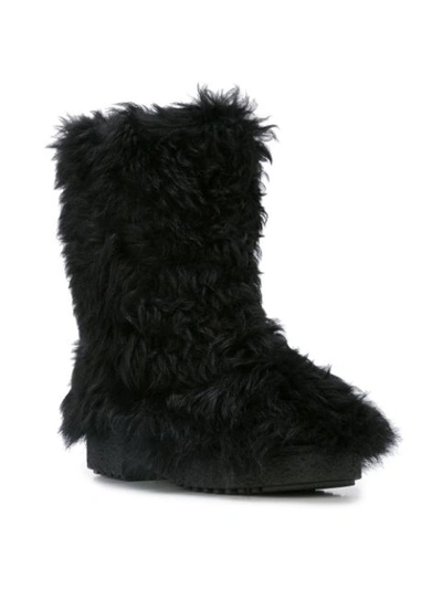 Shop Saint Laurent Winter Fur Boots - Black