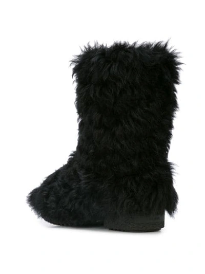 Shop Saint Laurent Winter Fur Boots - Black