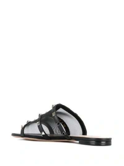 Shop Valentino Rockstud Sandals In Black