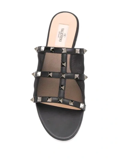 Shop Valentino Rockstud Sandals In Black