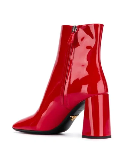 Shop Prada Patent Leather Zipped Booties In Red