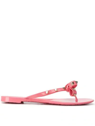 Shop Valentino Garavani Rockstud Bow Flip Flops In Hd8 Pink