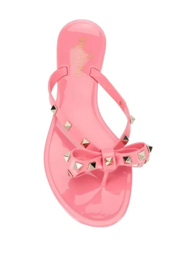 Shop Valentino Garavani Rockstud Bow Flip Flops In Hd8 Pink