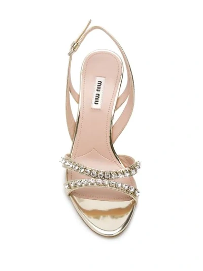 Shop Miu Miu Crystal Embellished Sandals In Pirite
