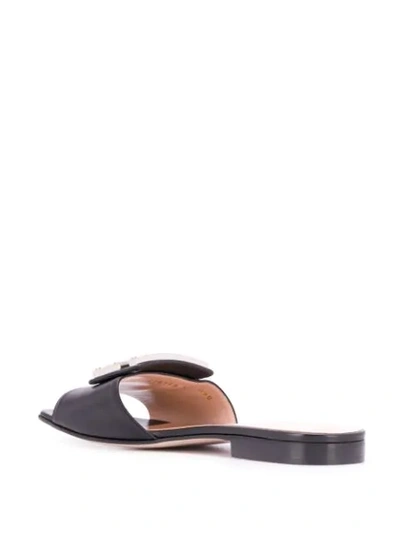 Shop Gucci Embellished G Flat Sandals In Black