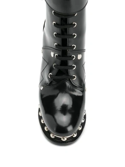 Shop Alexander Mcqueen Patent Stud Platform Boots In Black