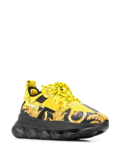 Shop Versace Chain Reaction Sneakers In Yellow