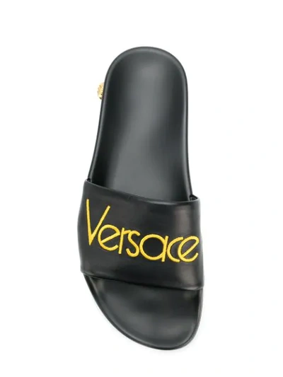 Shop Versace Logo Slider Sandals - Black