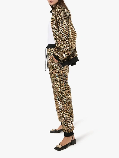Shop Gucci Rhombus Logo Metallic Track Pants In Black