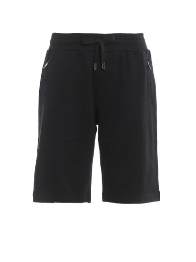 Shop Dolce & Gabbana Satin Logo Patch Short Track Pants In Black
