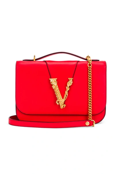 Shop Versace Leather Tribute Crossbody Bag In Red In Red & Gold