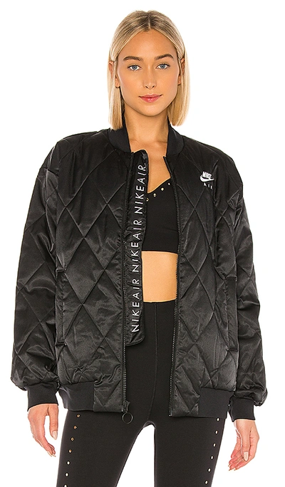 Shop Nike Nsw Air Synthetic Fill Satin Jacket In Black & Pumice