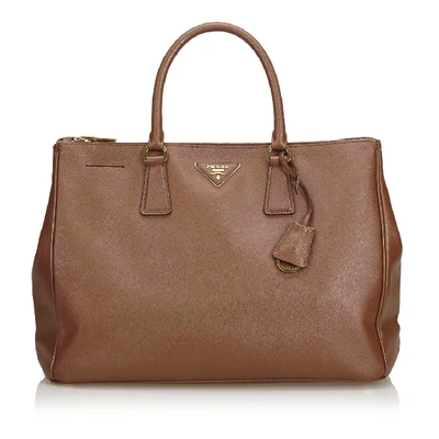 Shop Prada Saffiano Leather Galleria Handbag In Brown